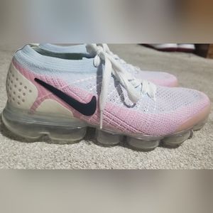 Women's Nike running shoes.